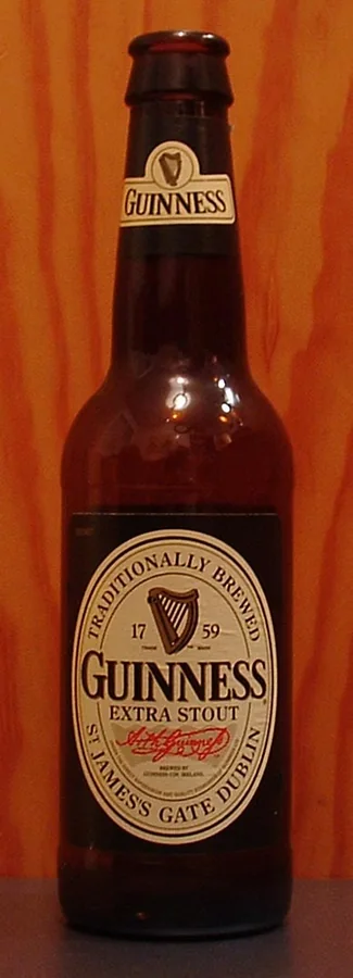 A standing bottle of Guinness Extra Stout