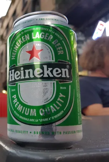 A standing Heineken can