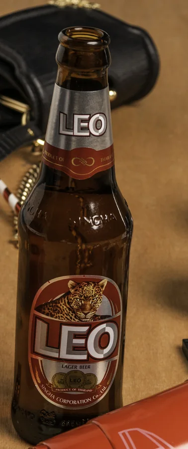 A standing bottle of Leo lager