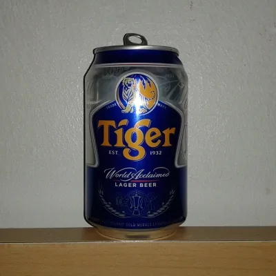 A standing Tiger lager can